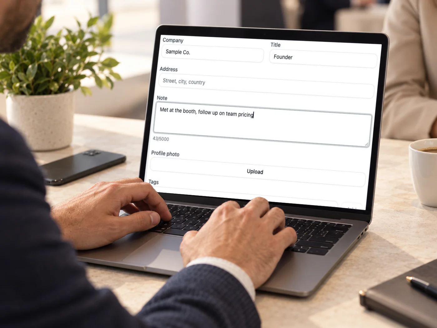 Writing a note on a saved contact in the web app.