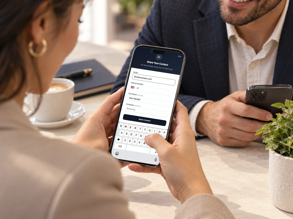 The other person filling in their name and email on the card's short form.