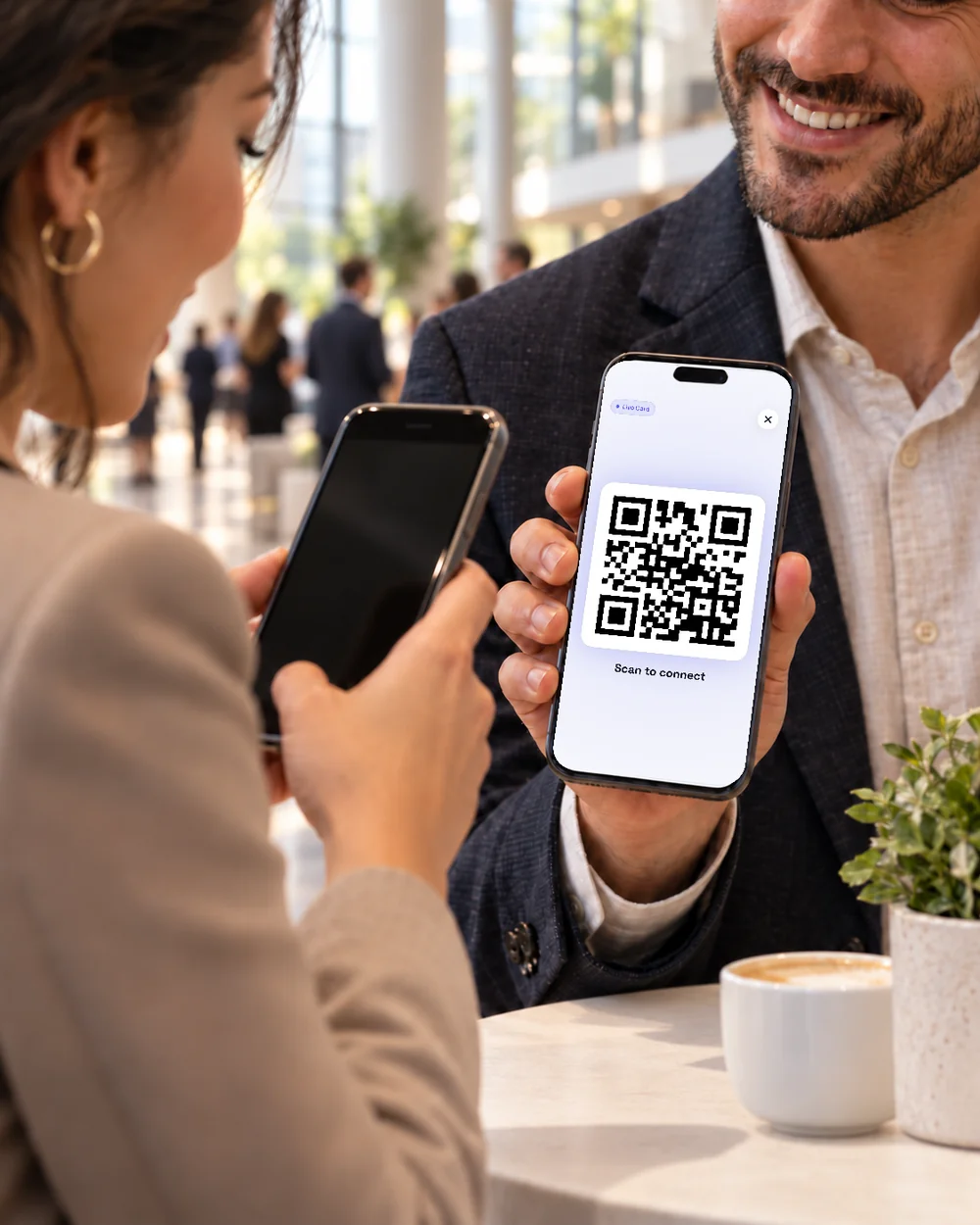Sharing a digital business card between sessions at a conference.